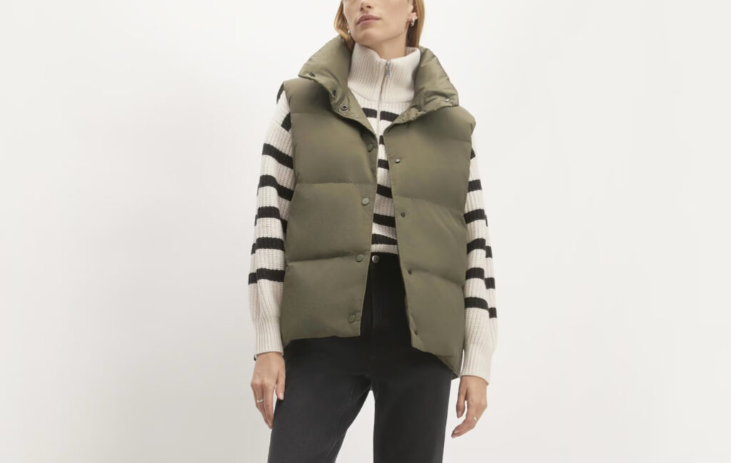 women wearing army green puffer vest